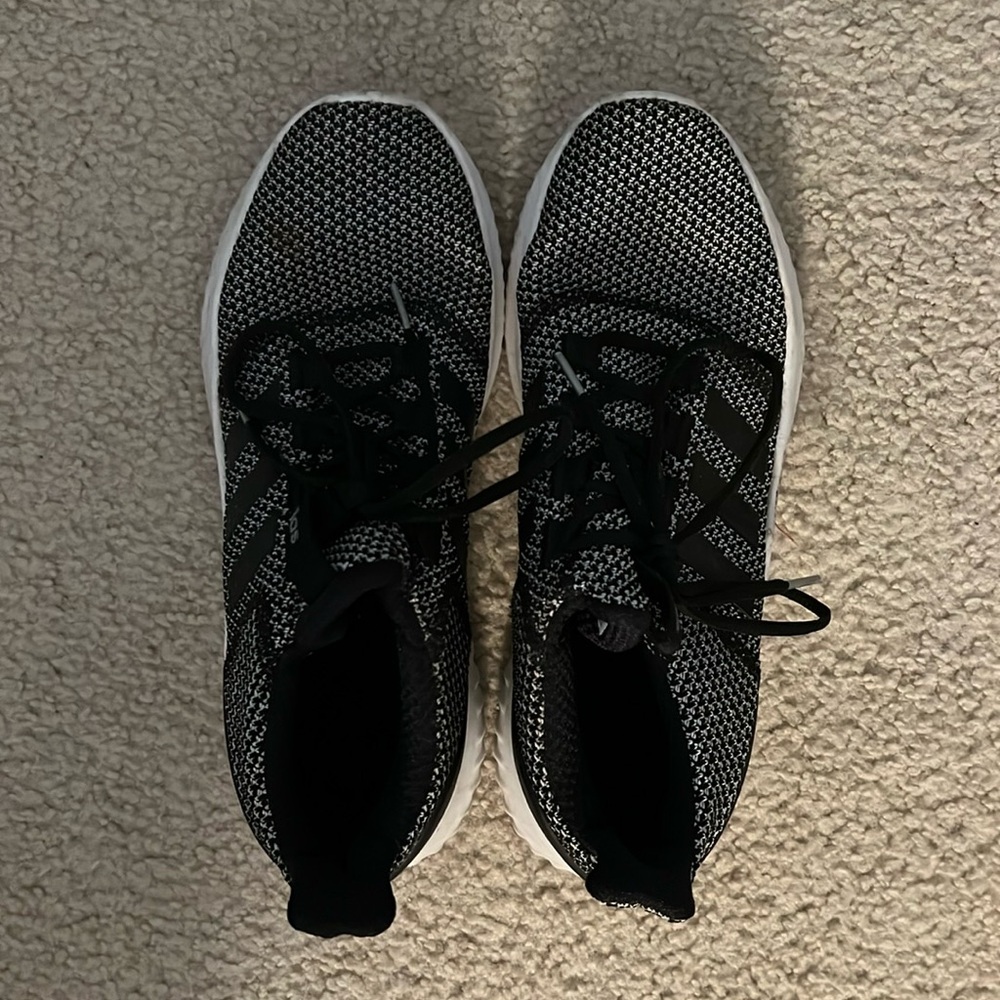 Black Adidas sneakers